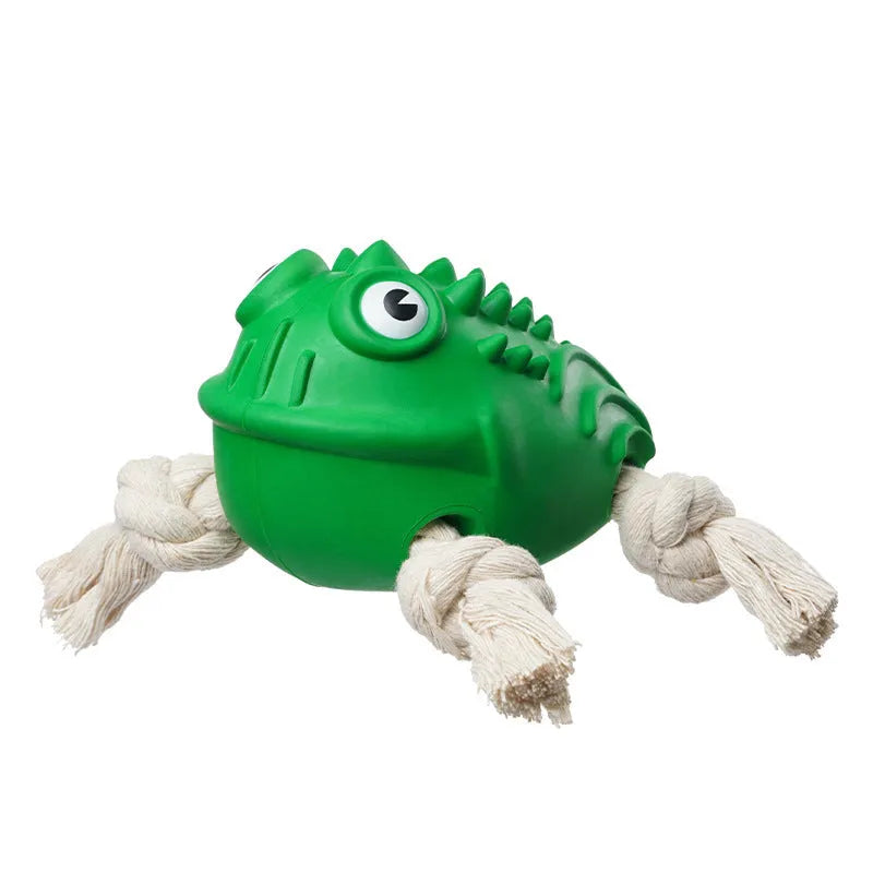Green indestructible rubber toad dog toy with cotton rope legs and black button eyes, for aggressive chewers