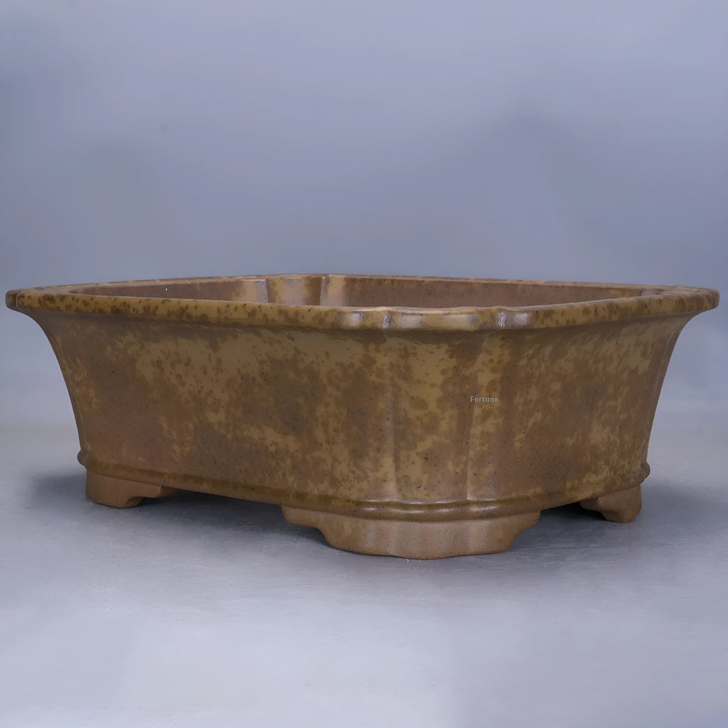 Modern rectangular purple sand floor planter with a visible water level gauge on its side.
