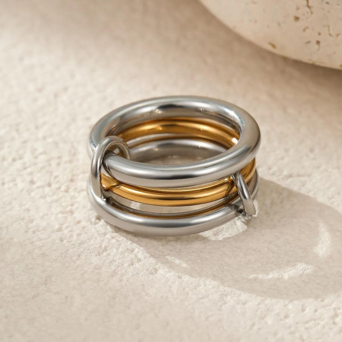 Stacked stainless steel women's ring with 18K gold plating in a colour-matched design.