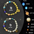 A pair of natural stone beaded bracelets featuring zodiac sign charms, laid flat.