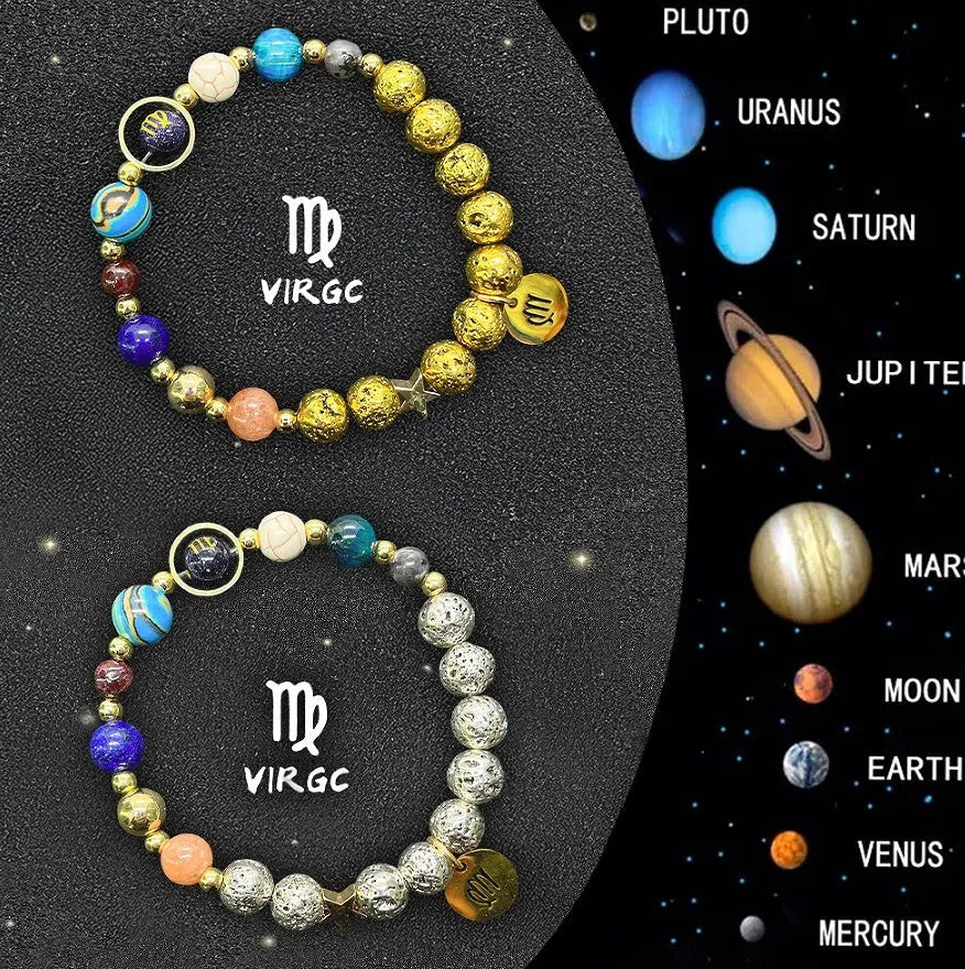 A pair of natural stone beaded bracelets featuring zodiac sign charms, laid flat.