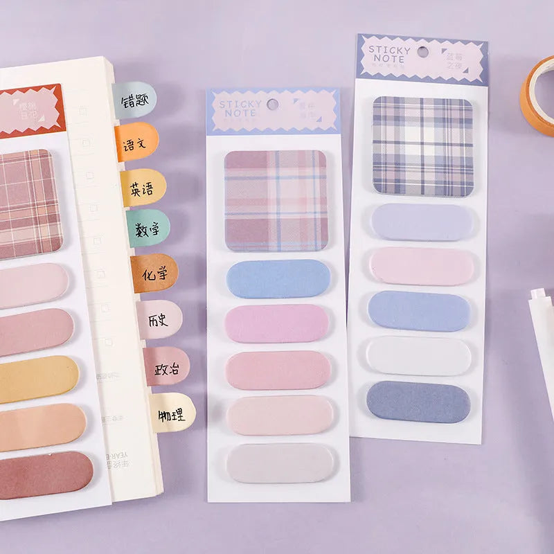 Pack of colourful sticky notes showing eight different colour covers including blue, green, and pink designs.