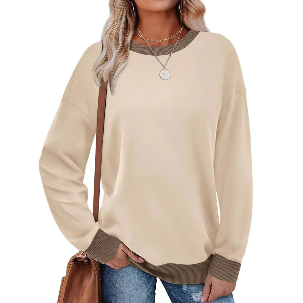 Women's loose striped long sleeve top in apricot colour on hanger