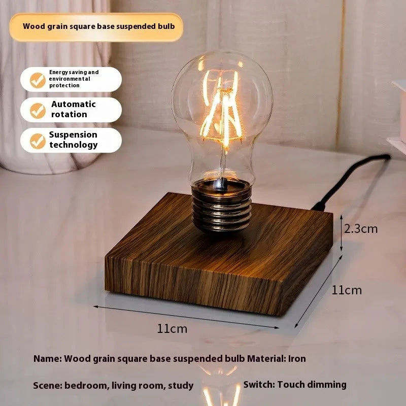 Creative iron art suspension bulb night lamp on a black wood grain desk base