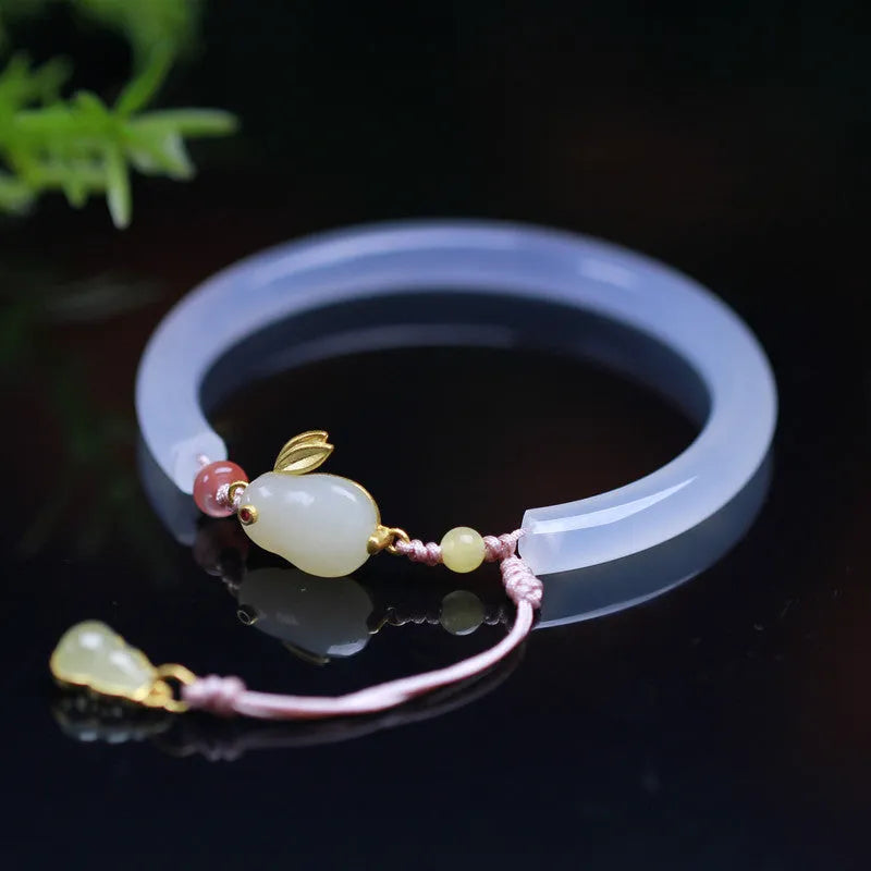 Handmade natural white agate beaded bracelet with S925 sterling silver fittings and a Ruyi charm.