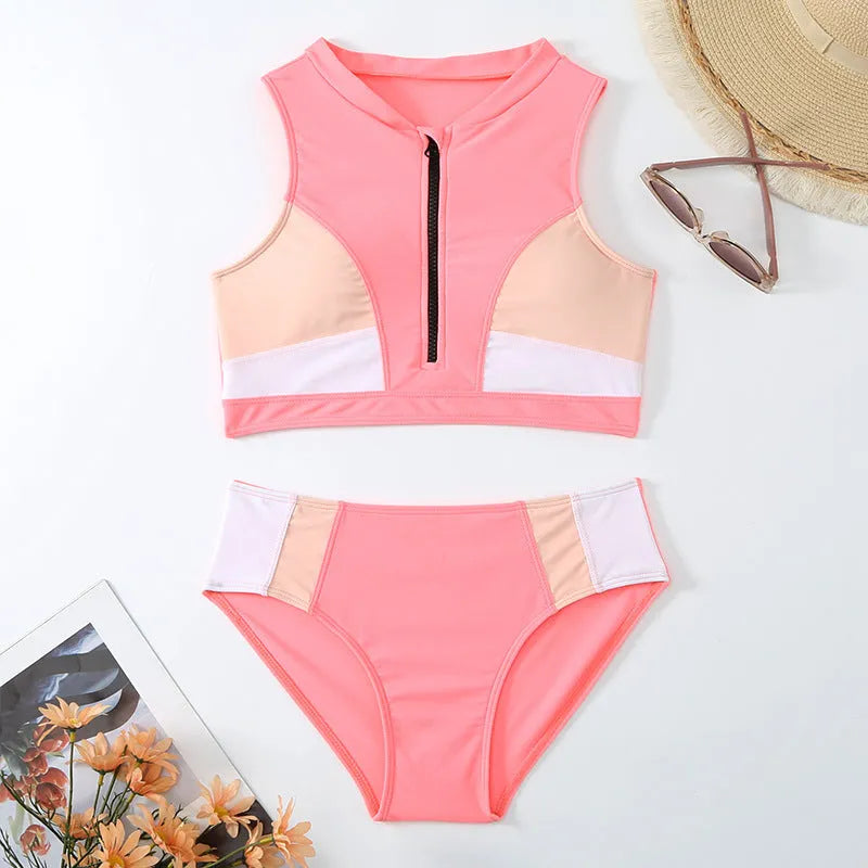 Pink high-waist bikini swimsuit set with brief bottoms and a matching bra on a mannequin.