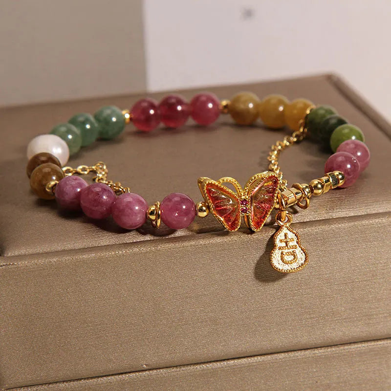 Natural jade coloured tourmaline bracelet with butterfly gourd pendant on adjustable agate bead band