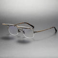 Men's retro polarized sunglasses with pure titanium frame in gold colour and black grey lenses