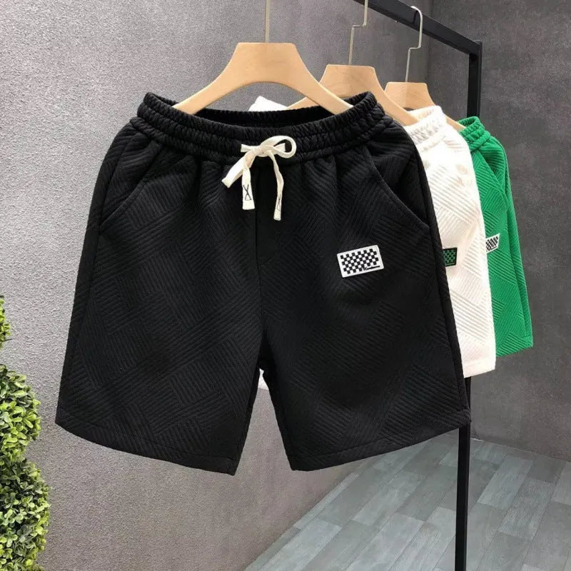 Casual sports shorts in polyester with micro elasticity fabric in solid colour options