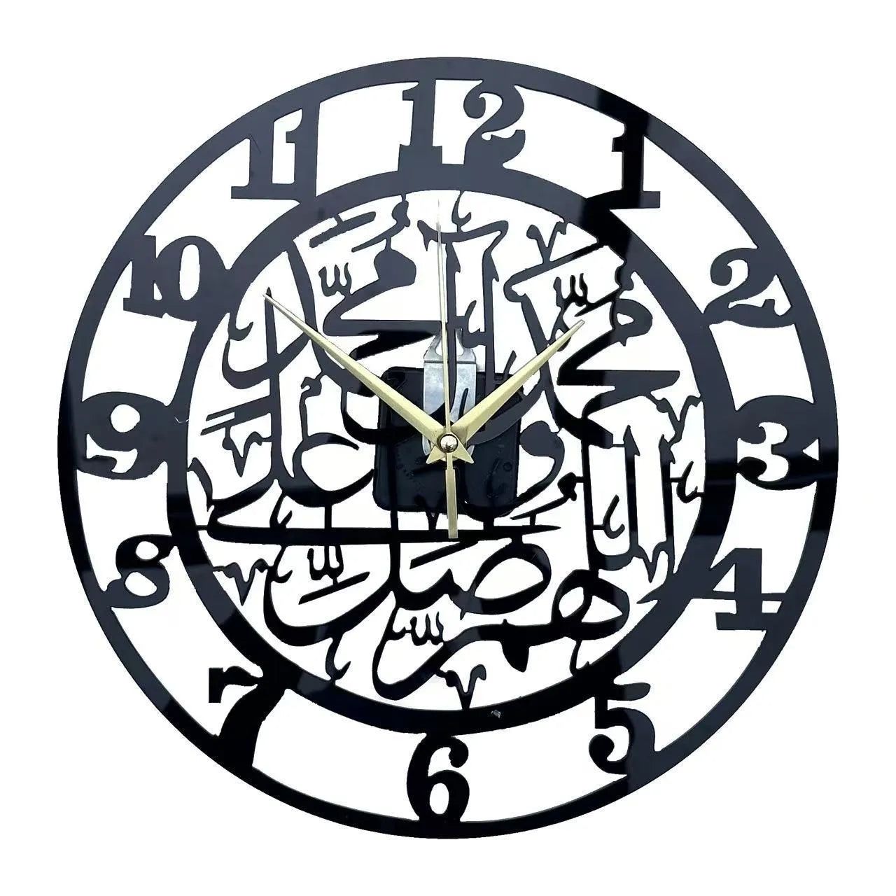 Acrylic black wall clock 30cm Mediterranean style with gold accents hanging on a light-coloured wall