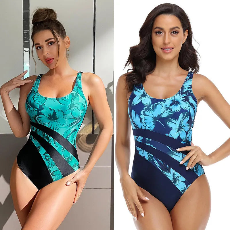 Green and blue printed one-piece swimsuit for women with a conservative briefs style.