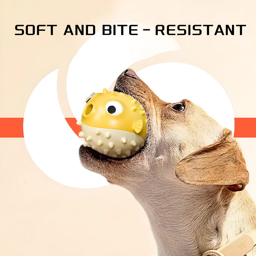 A yellow, fish-shaped durable dog chew toy with a textured surface and built-in squeaker.