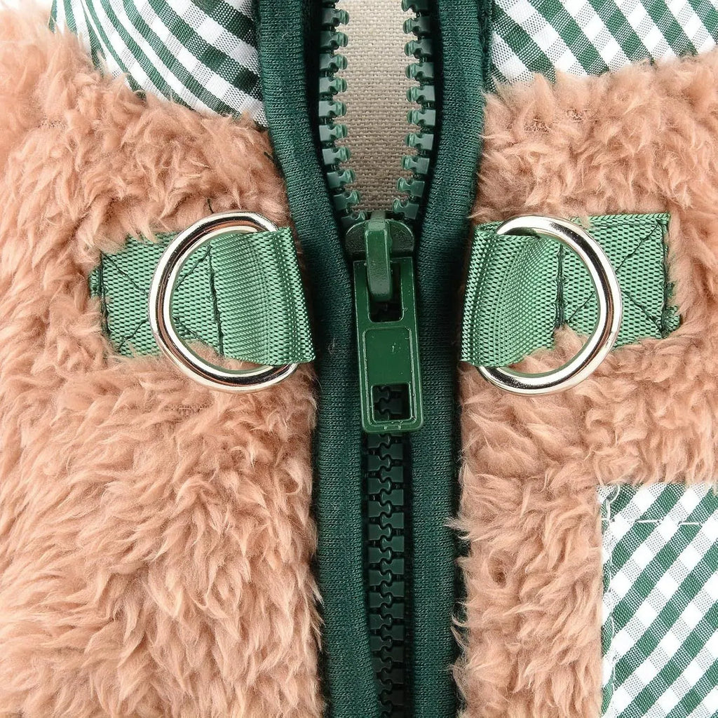Green plush fleece dog jumpsuit with a back zipper on a small dog