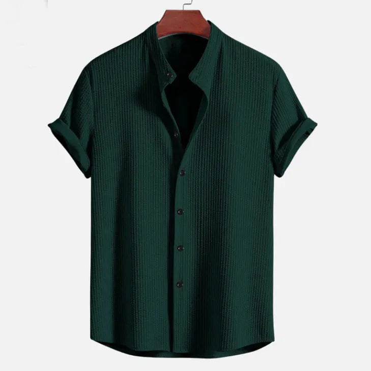 Men's loose-fitting short sleeve casual shirt in polyester, shown in a selection of available colours.