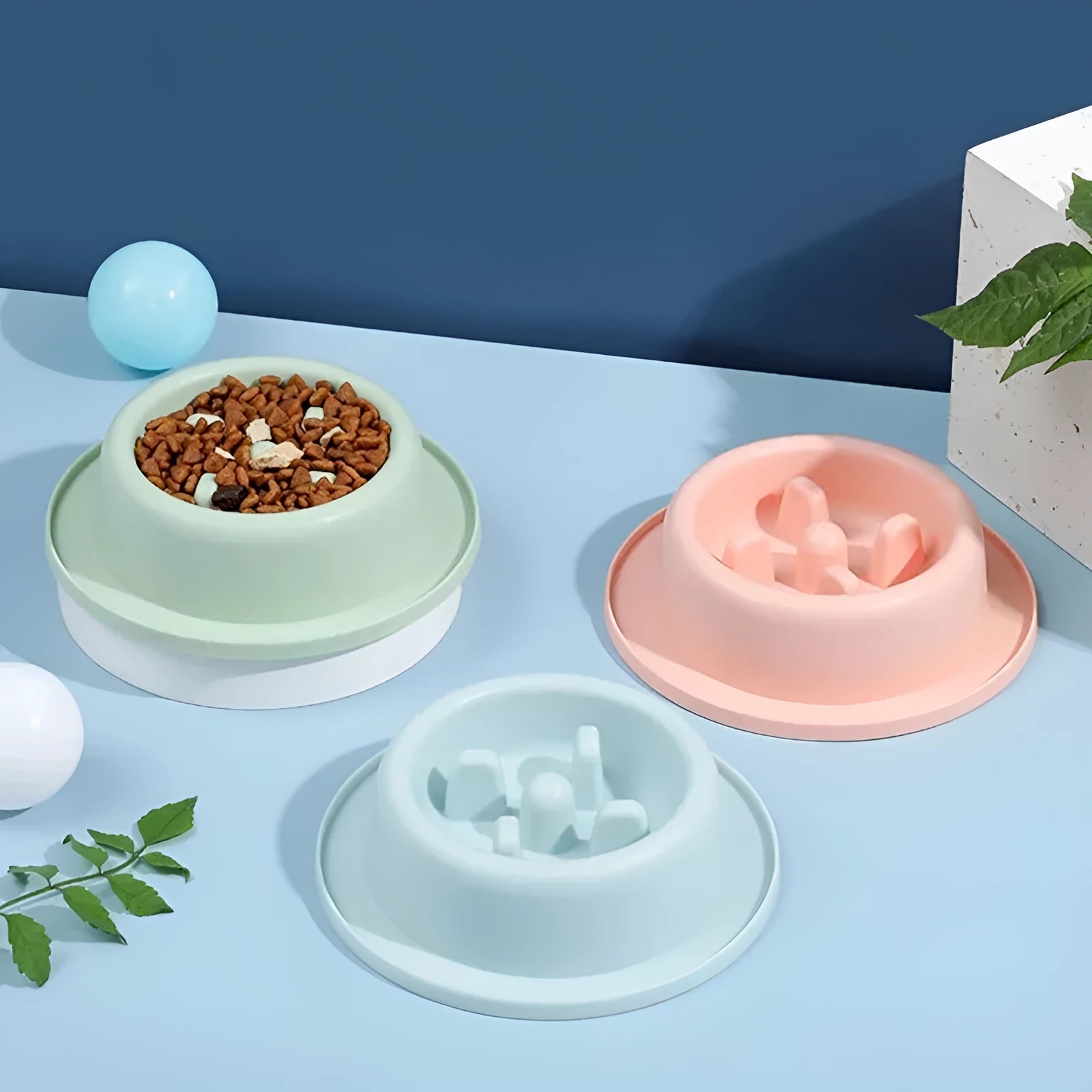 PP plastic pet slow feeder bowl in blue, green, or pink with maze design and non-slip base