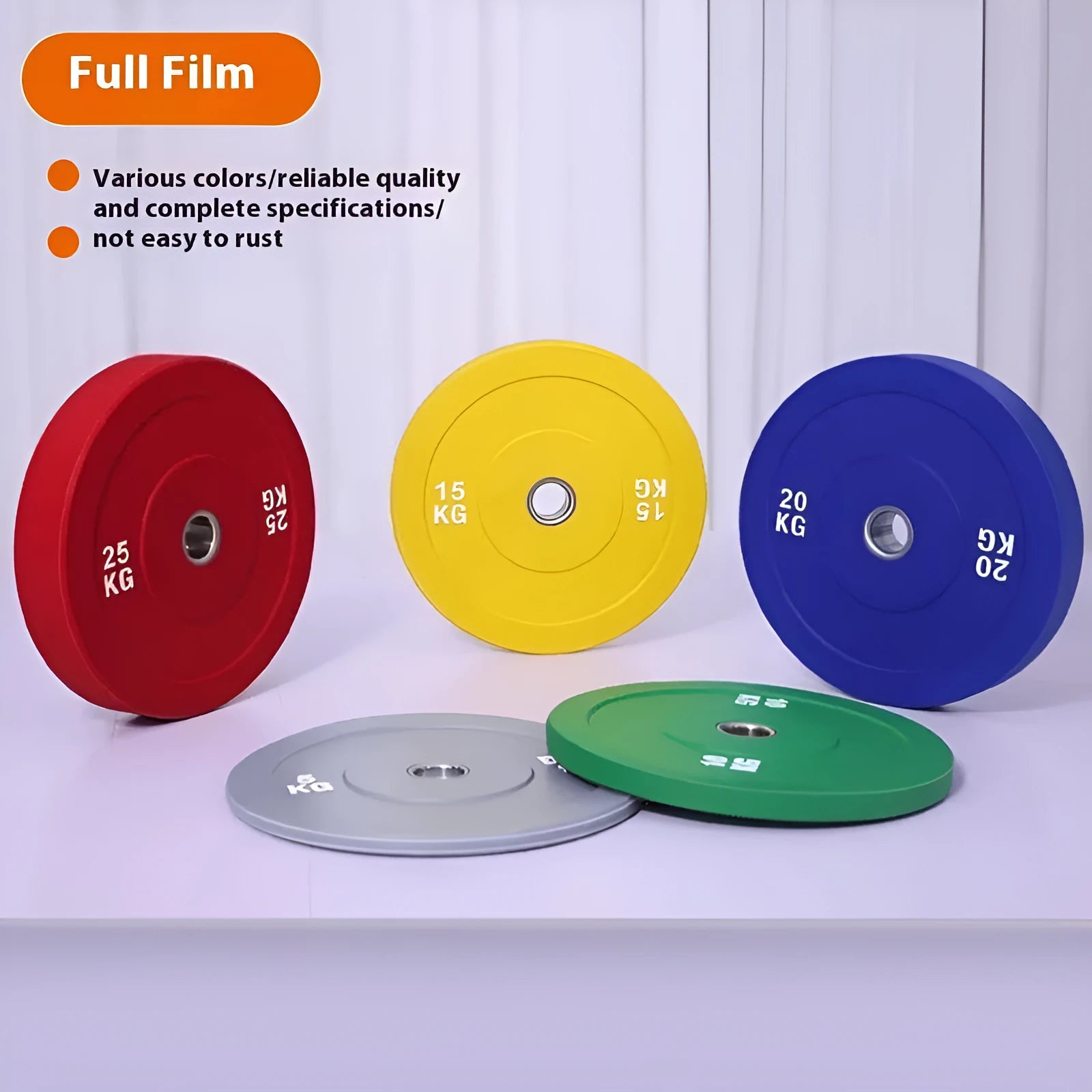 Macaron elastic rubber weight plate in blue 20kg with large centre hole on a gym floor
