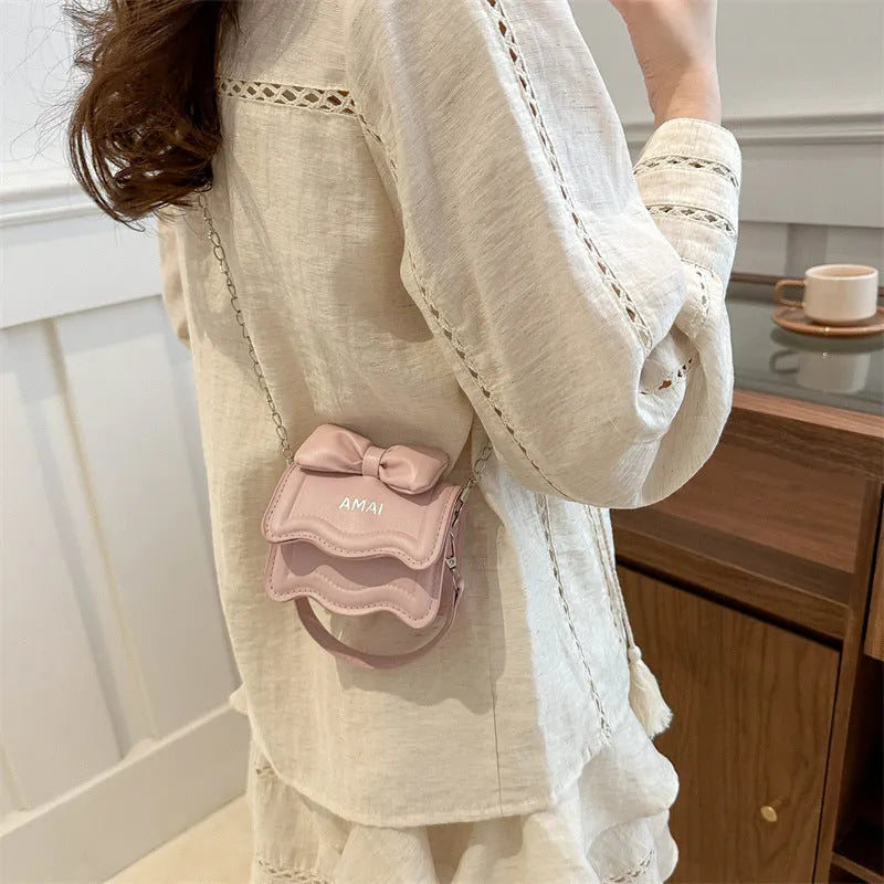 Mini crossbody bag in seven colour options with single shoulder strap