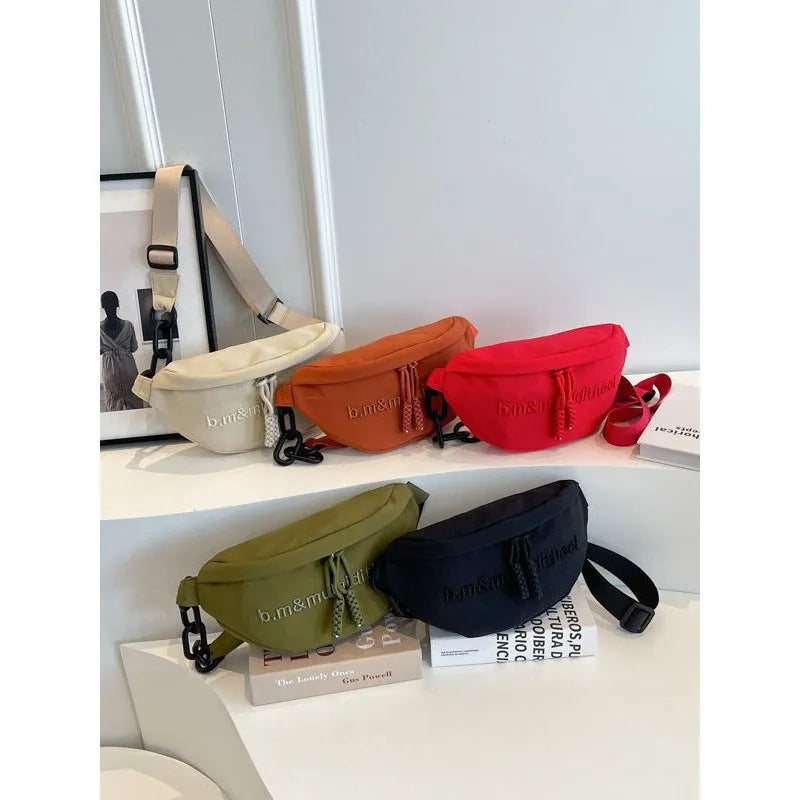 Women's nylon sports shoulder bag in beige with letter and embroidery details and chain accent