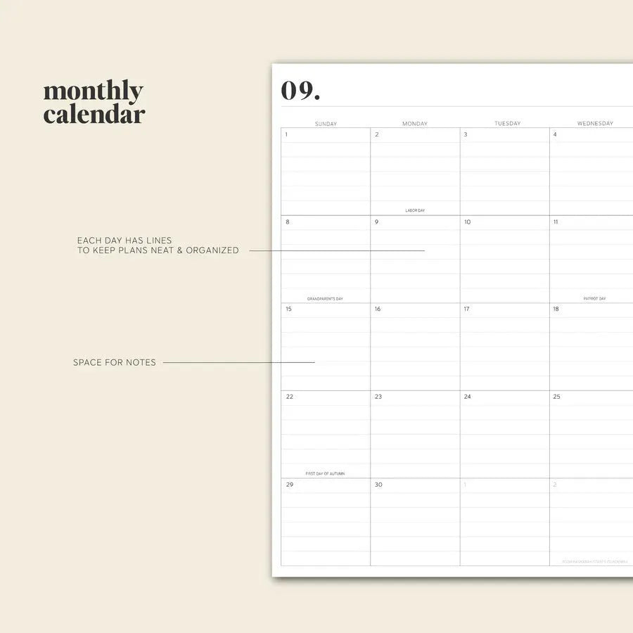 Cherry red daily schedule coil notebook with wire-o binding open on desk