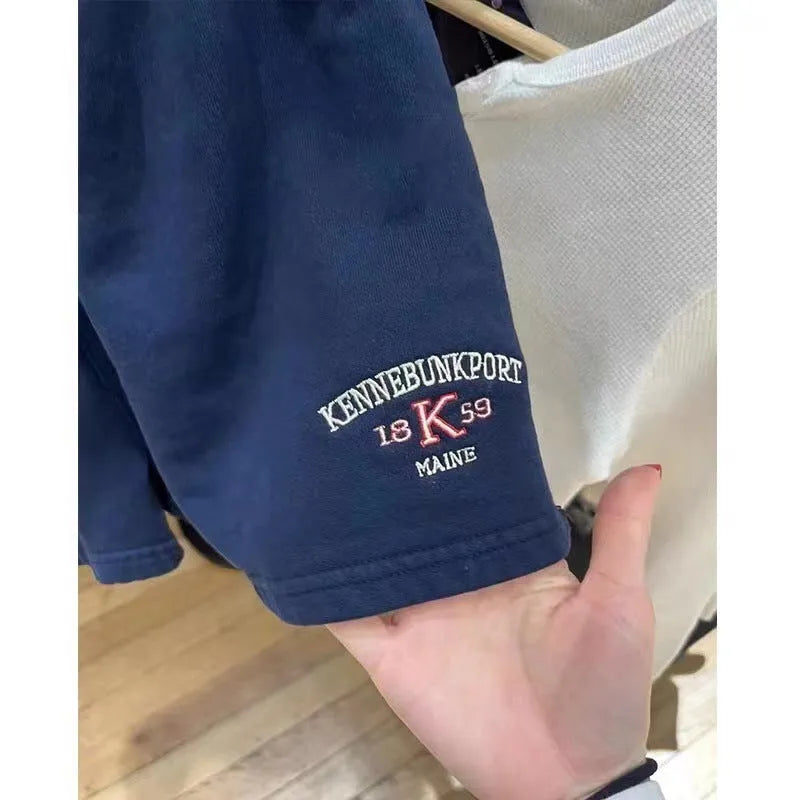 Women's dark blue cotton high top sports shorts with white flag embroidery and navy blue panels