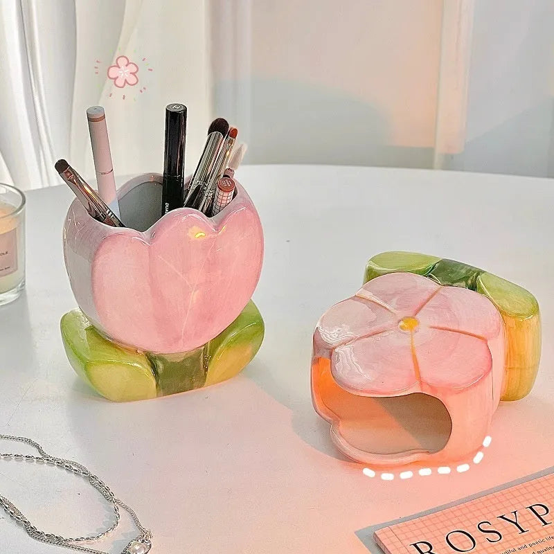Ceramic flower pen holder storage box in a floral design on a desk