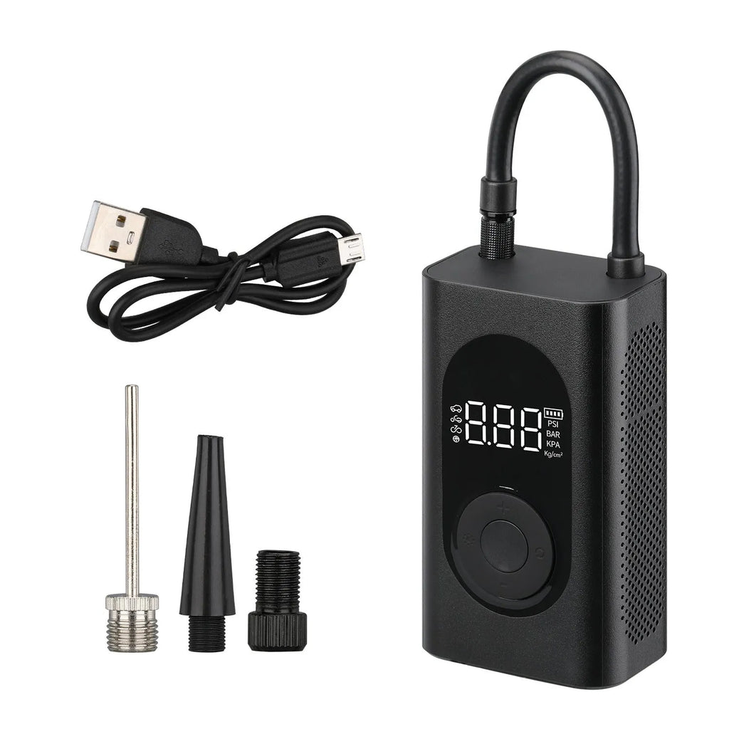 Portable handheld mini wireless tyre pump with power bank and flashlight on a grey background.