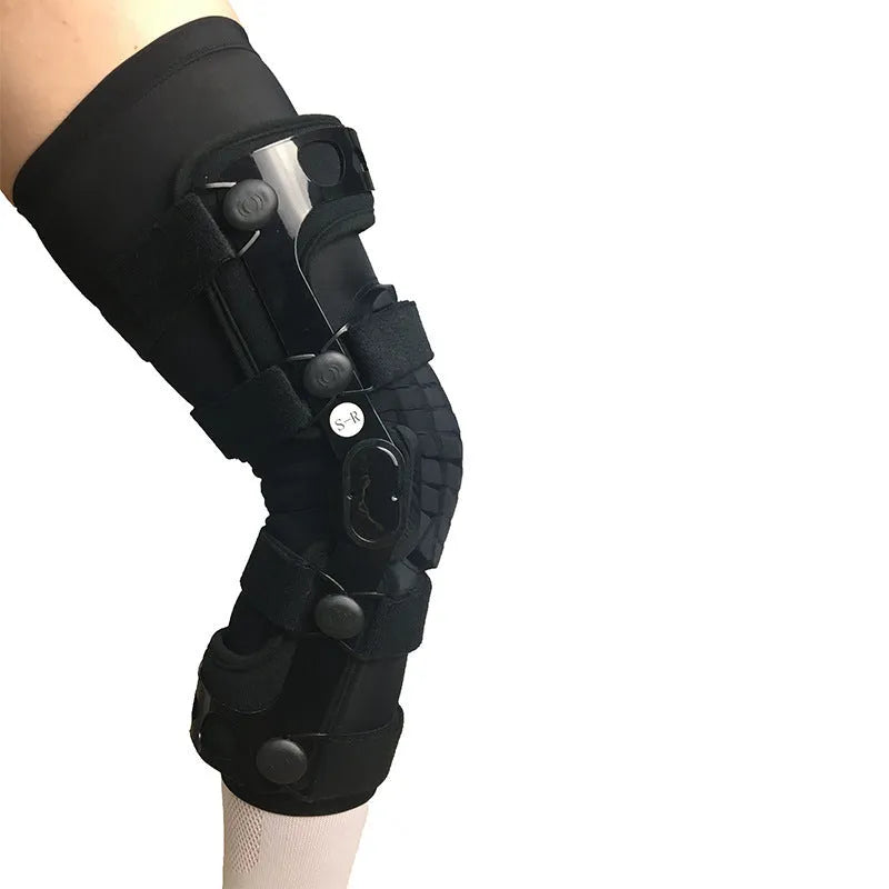 Black anterior ligament knee supporter with structural framework on brushed cloth background
