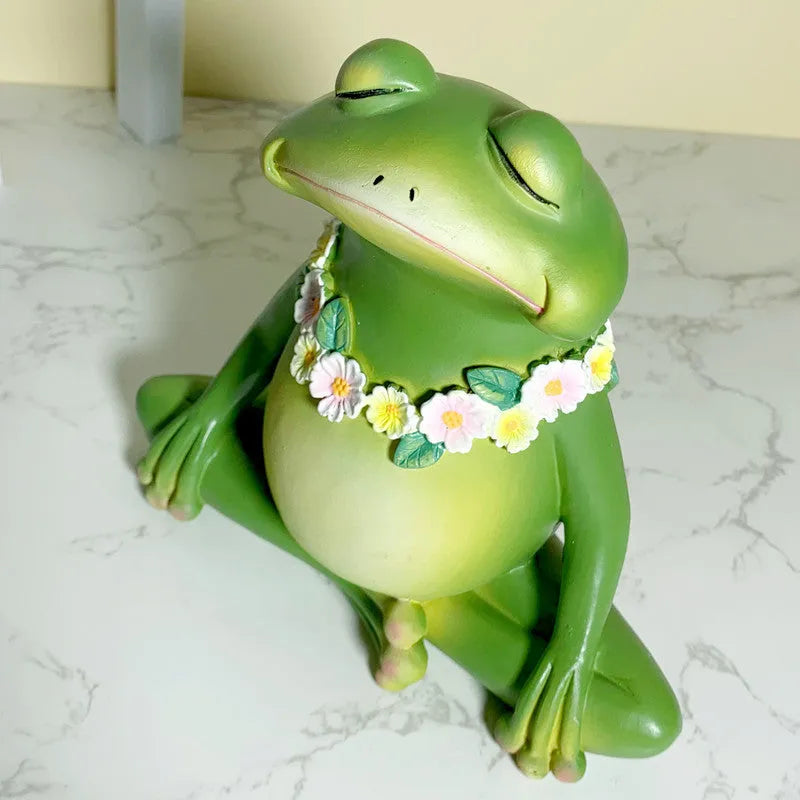 European-style plastic and resin magic yoga frog ornament in RDW123 colour on a shelf.