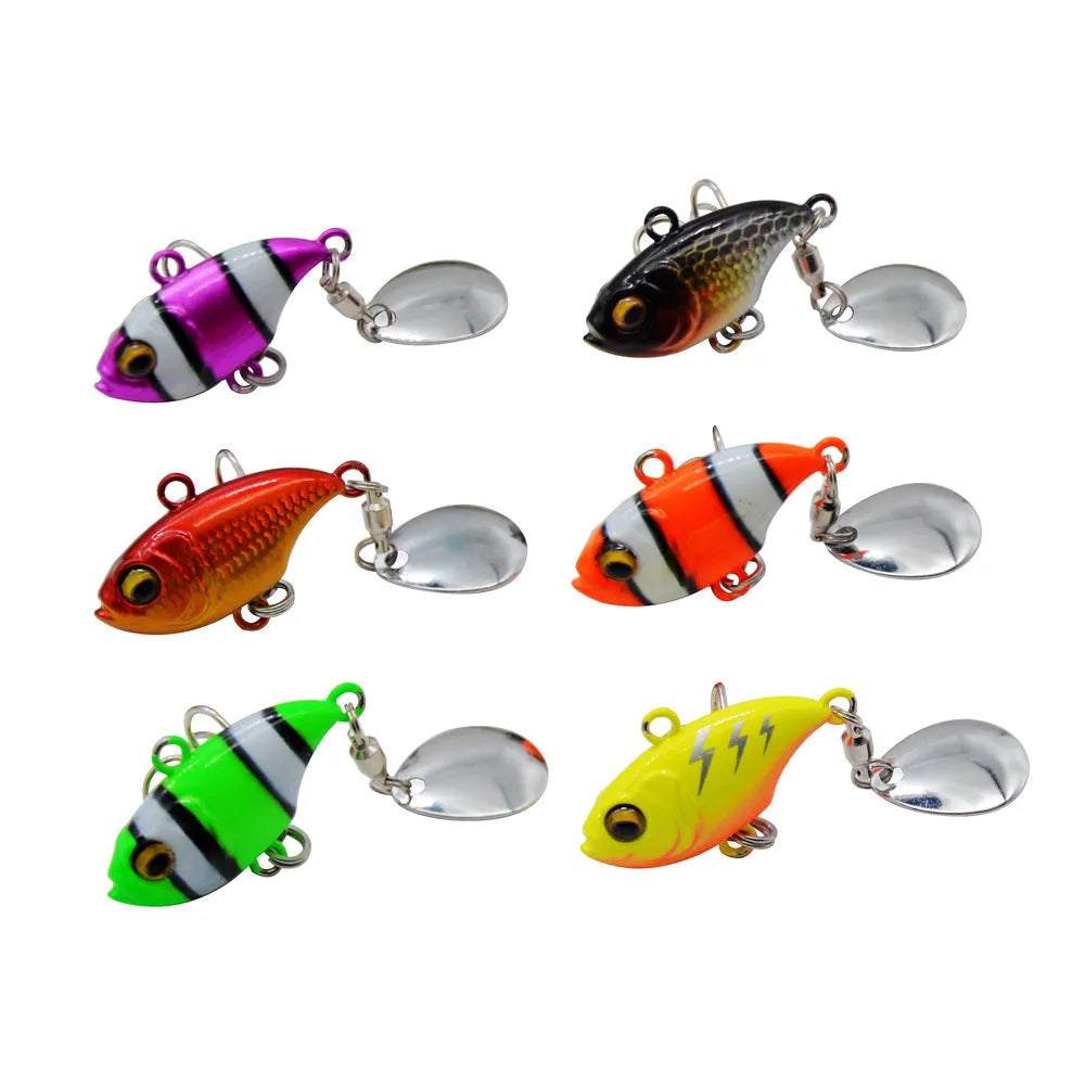 Metal sea fishing lure with a spinning sequin plate in gold colour with treble hook.