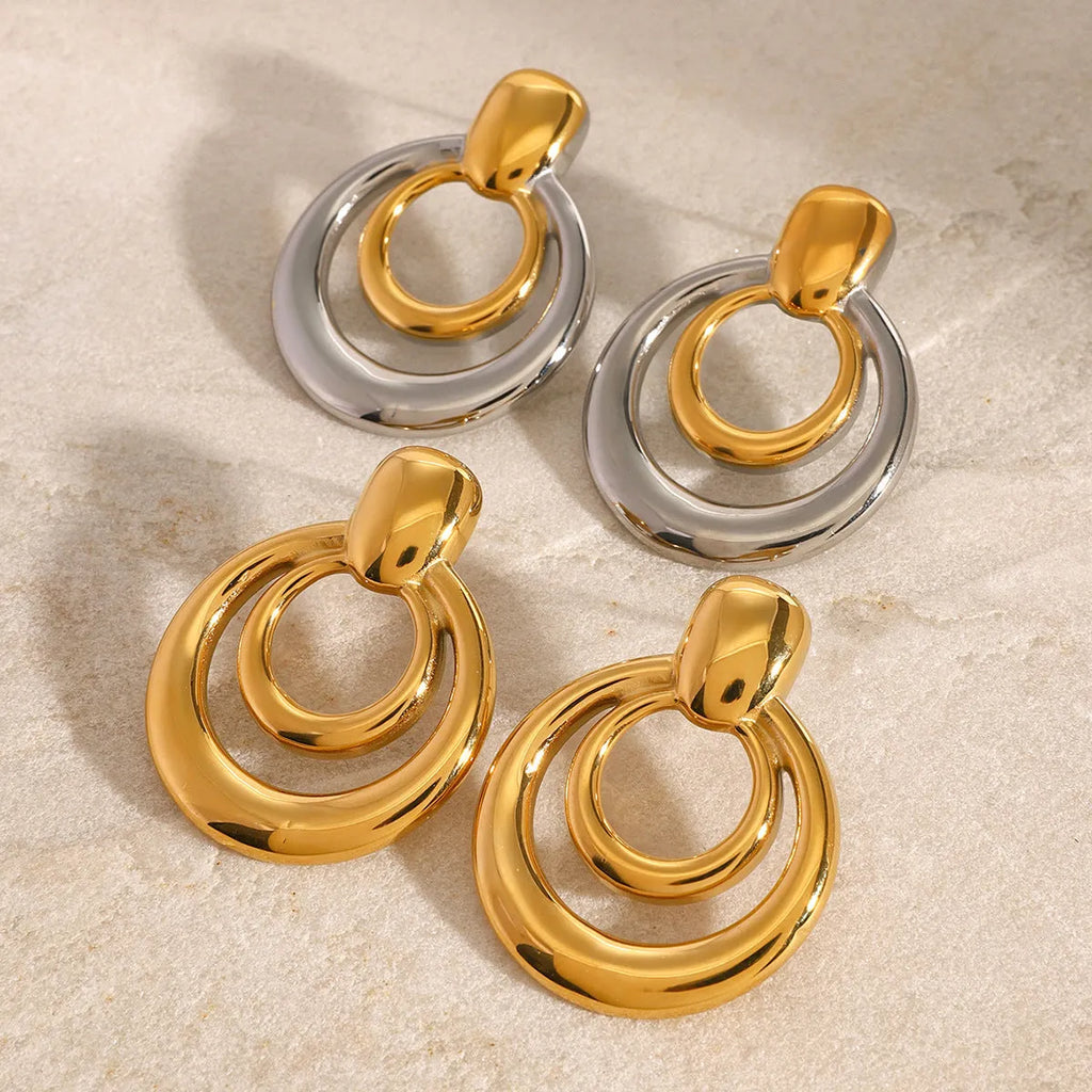 18K gold electroplated titanium steel hollow stud earrings with double layer geometric round design