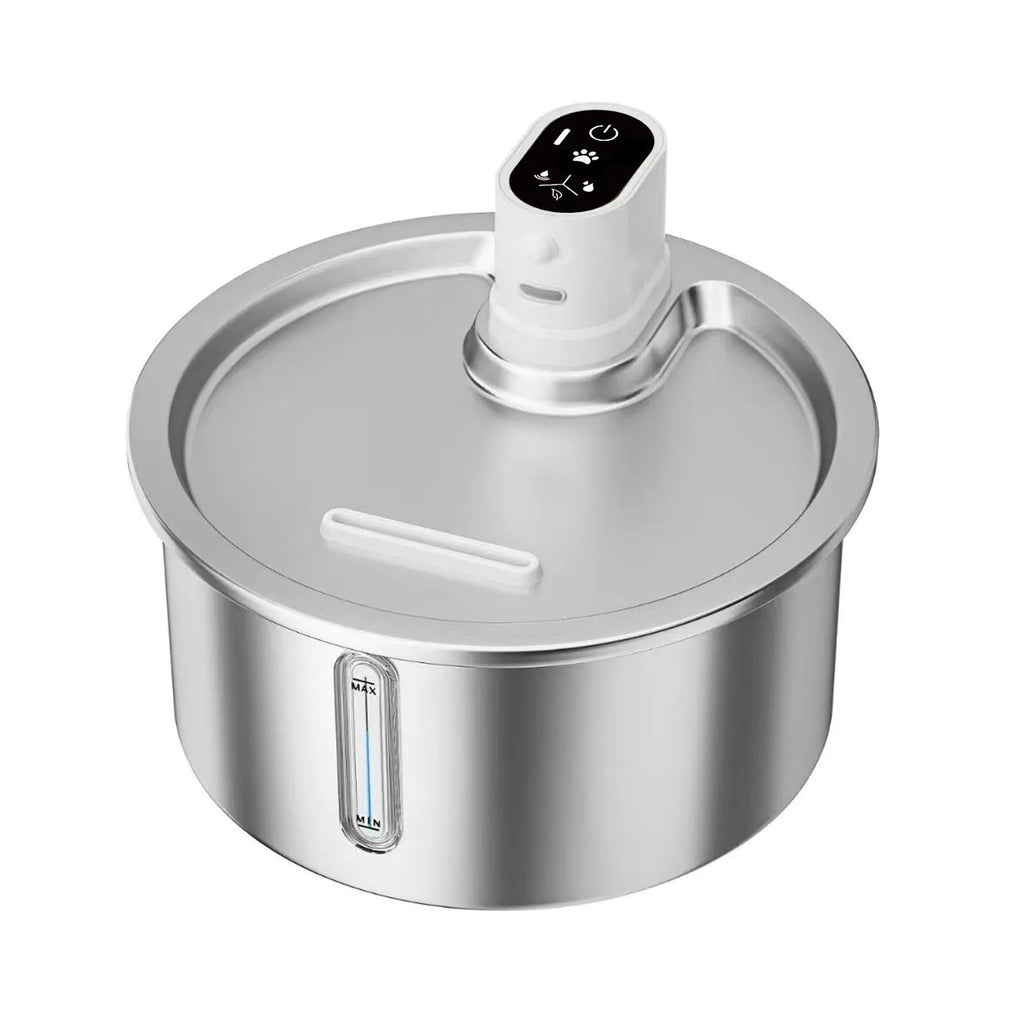 Stainless steel pet water fountain with a white constant temperature heating base on a wooden floor.