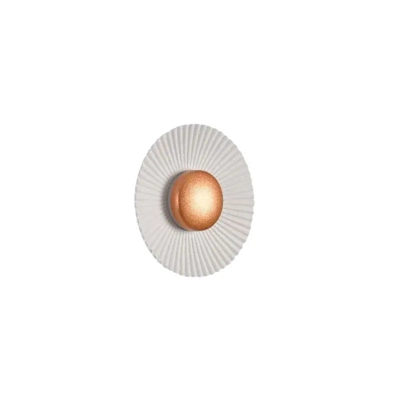 Round wall-mounted LED light with aluminium shade in a gold and white two-tone colour option.