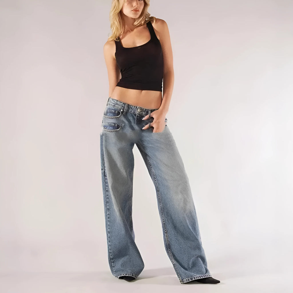 Women's blue cotton wide leg mop trousers with low waist and spliced stitching detail.