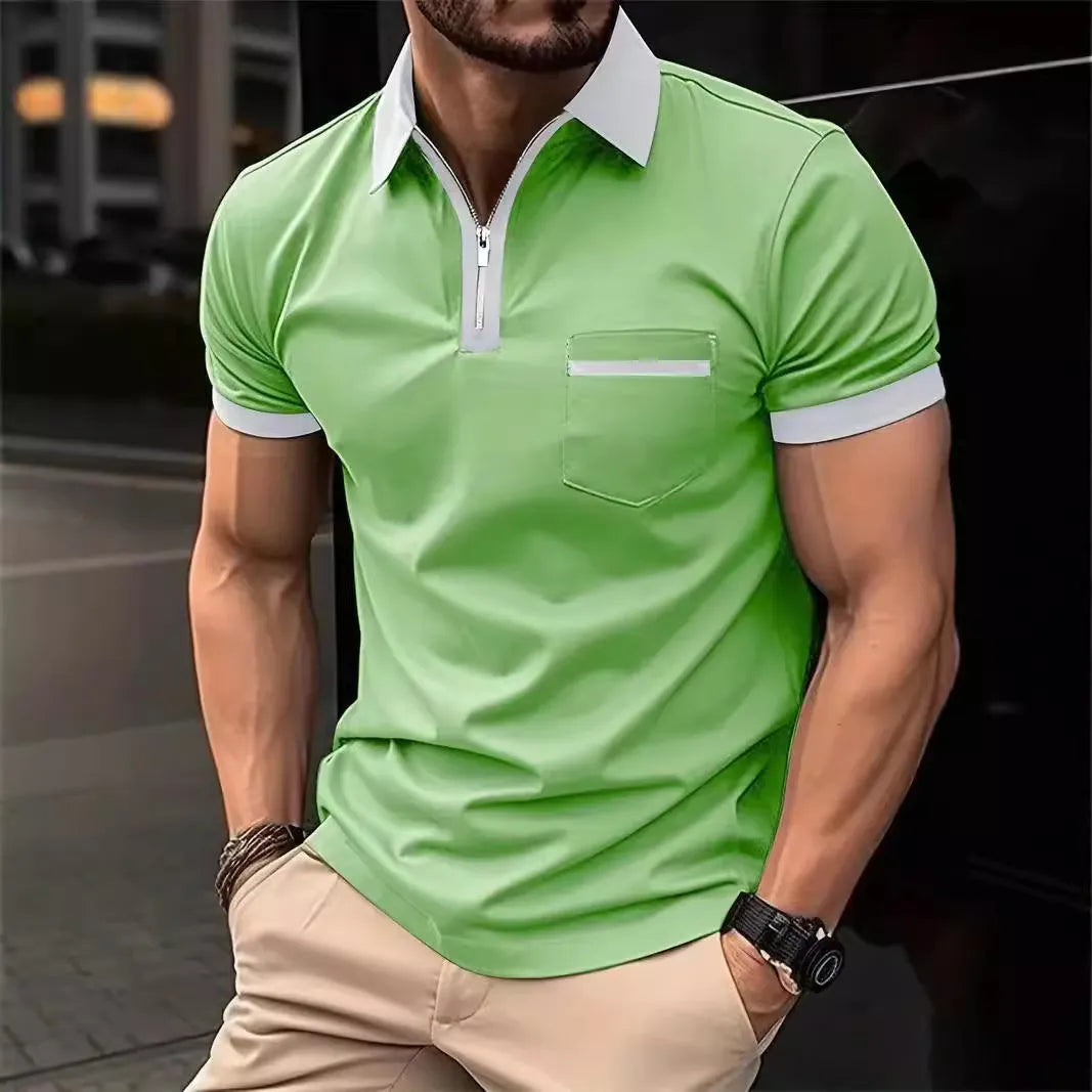 Man wearing a loose-fit men's short sleeve casual shirt with a chest pocket and zipper decoration.