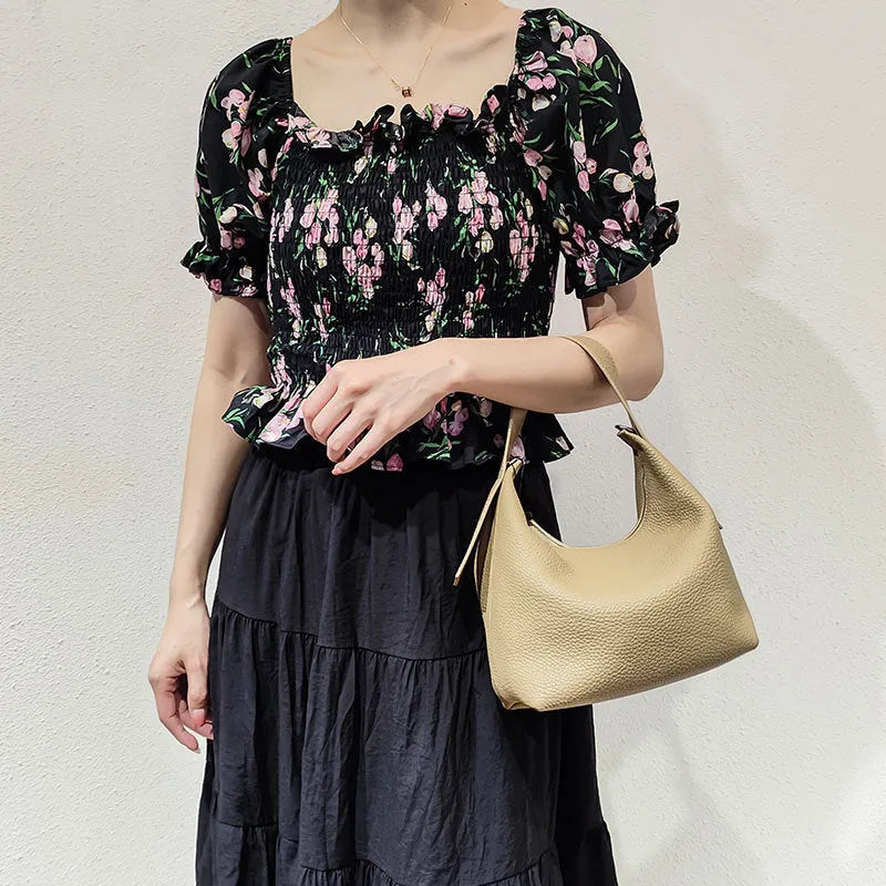 Casual first layer cowhide women's handbag in soft pillow shape with sewing line detail and single shoulder strap