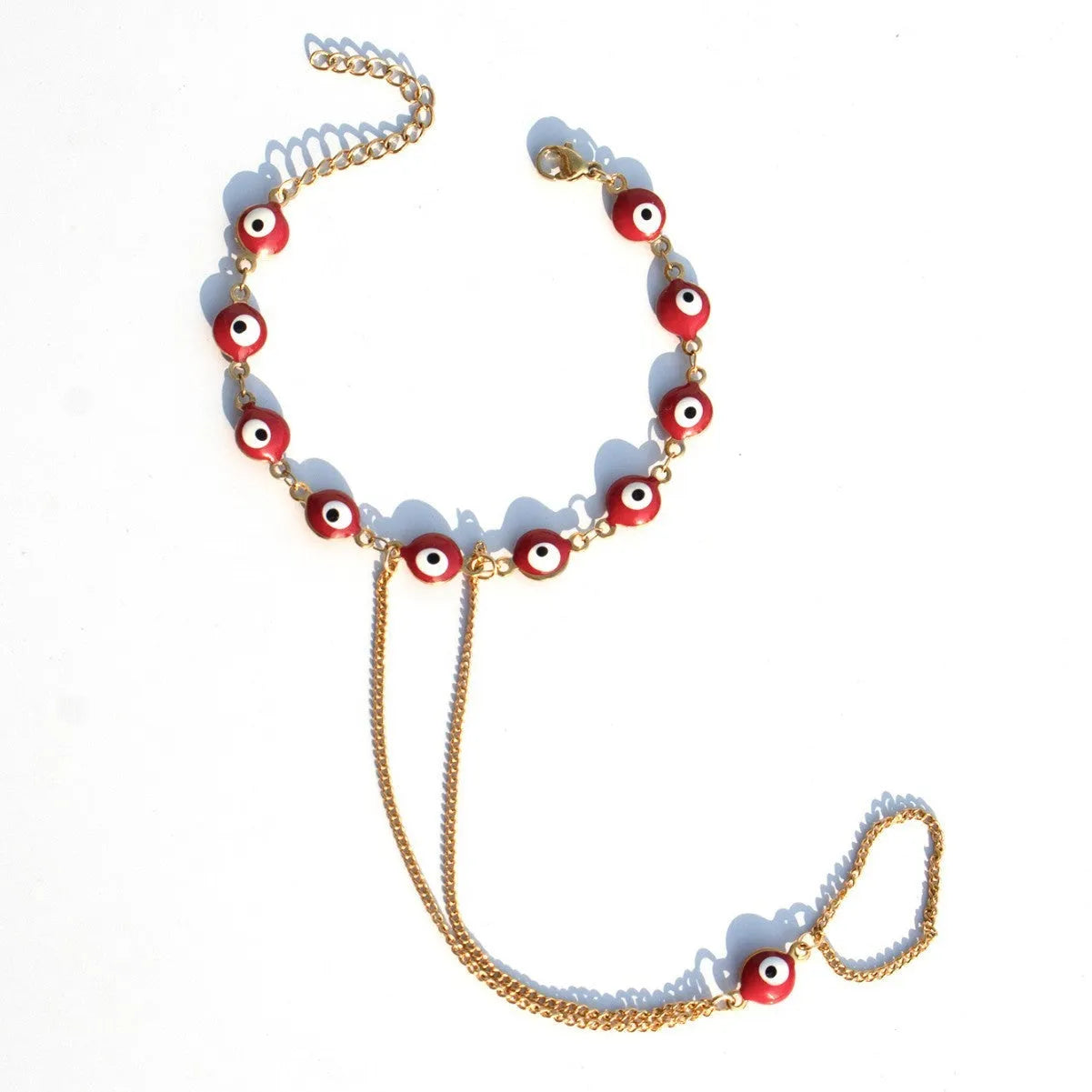 Women's titanium steel round eyes lucky mitten-type bracelet in colourful electroplated finish on a neutral background