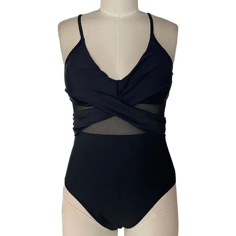 Women's mesh spliced backless one-piece swimsuit in solid black colour with polyester lining, Asian sizes S to 2XL