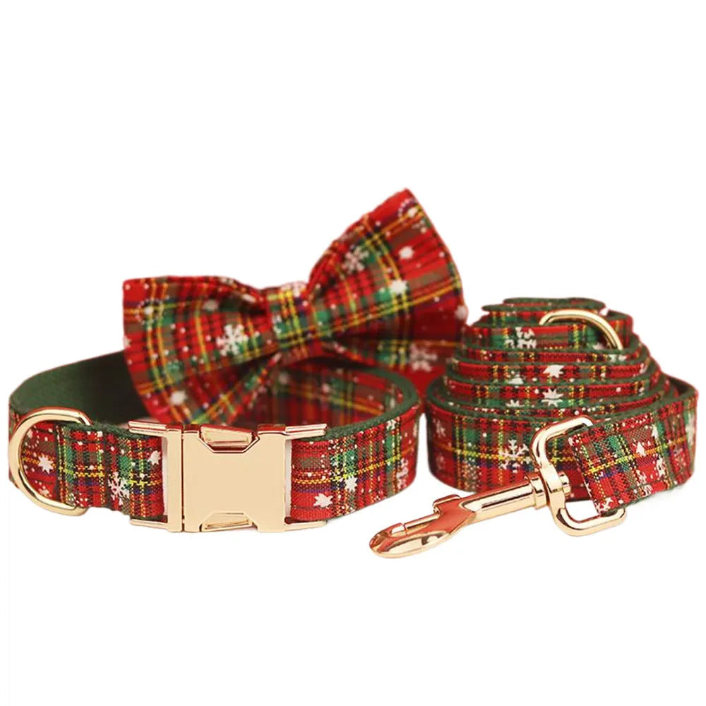 Green background snowflake pattern Christmas pet collar set with matching bow, leash and vest