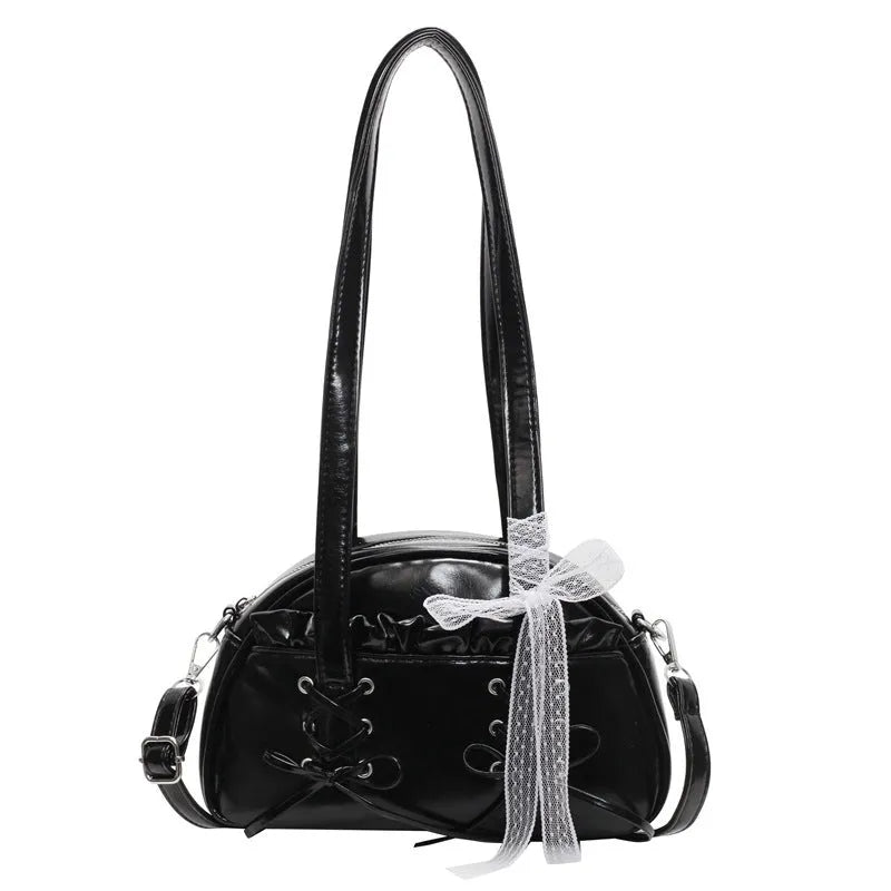 Women's casual PU leather shoulder bag with a bandage bow design and internal phone compartment.