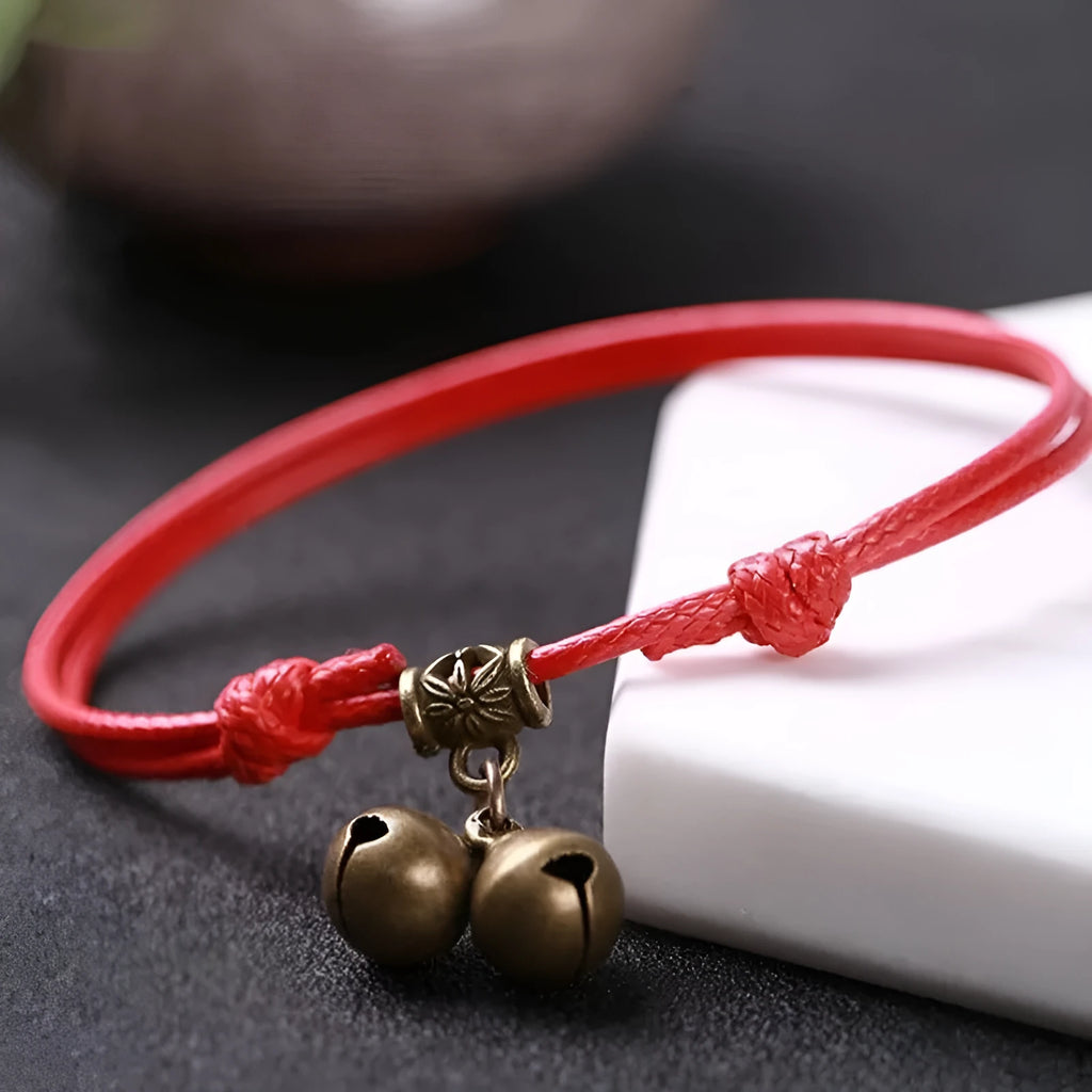 Nylon rope dog collar with brass bell shown in black, red, and coffee colours.