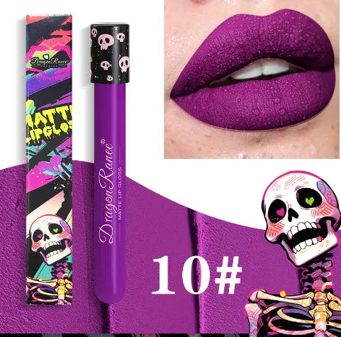 Halloween lip gloss in skull-shaped test tube packaging showing matte metallic gold and silver colours