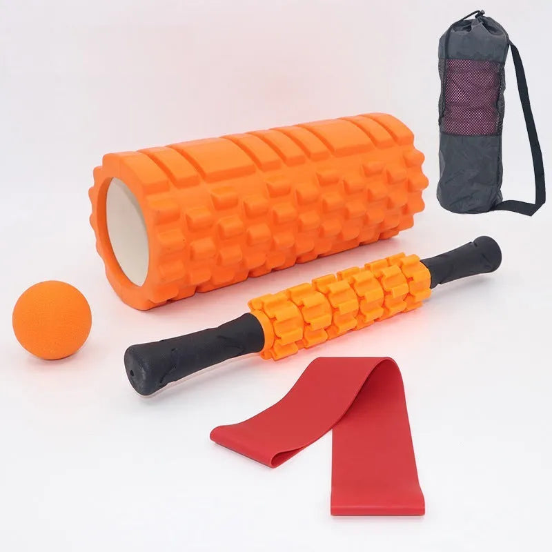 Black 33cm gear-textured foam massage roller on a white background.
