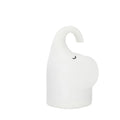 DOMI Elephant silicone night light with warm white glow on a bedside table