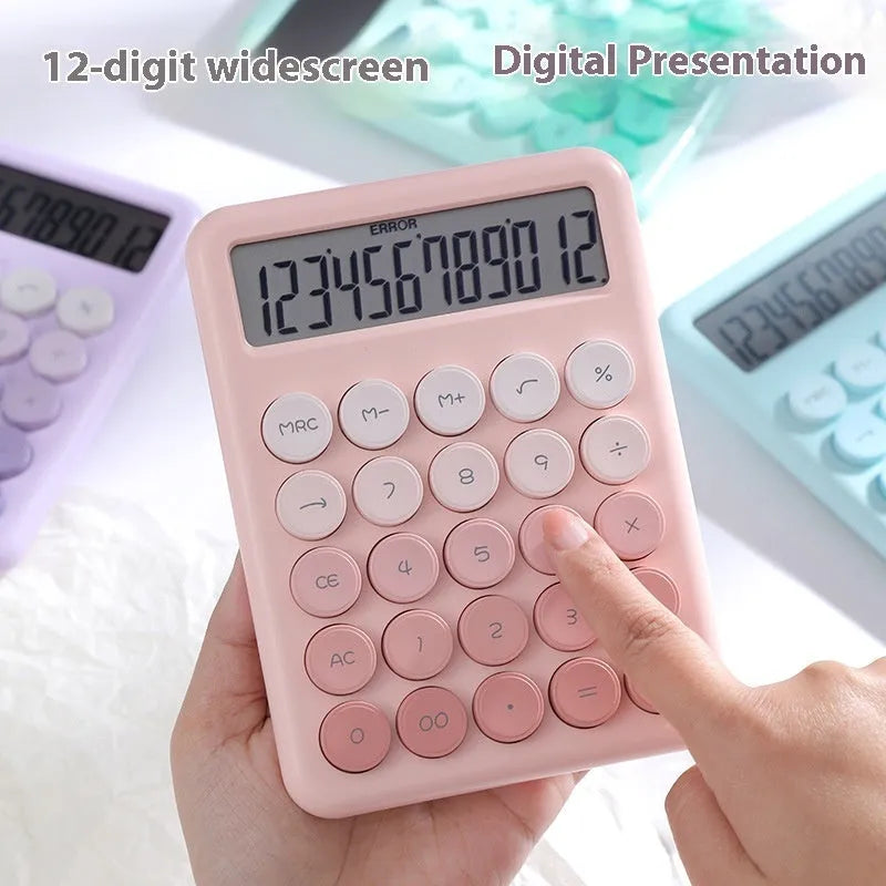 Desktop calculator with gradient colour finish in violet, cherry blossom pink, glacier blue, or mint green on a desk.