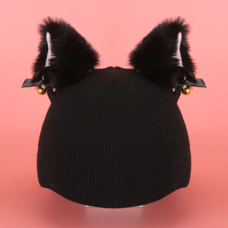 A soft plush cartoon character cover stretched over a medium-sized motorcycle helmet.
