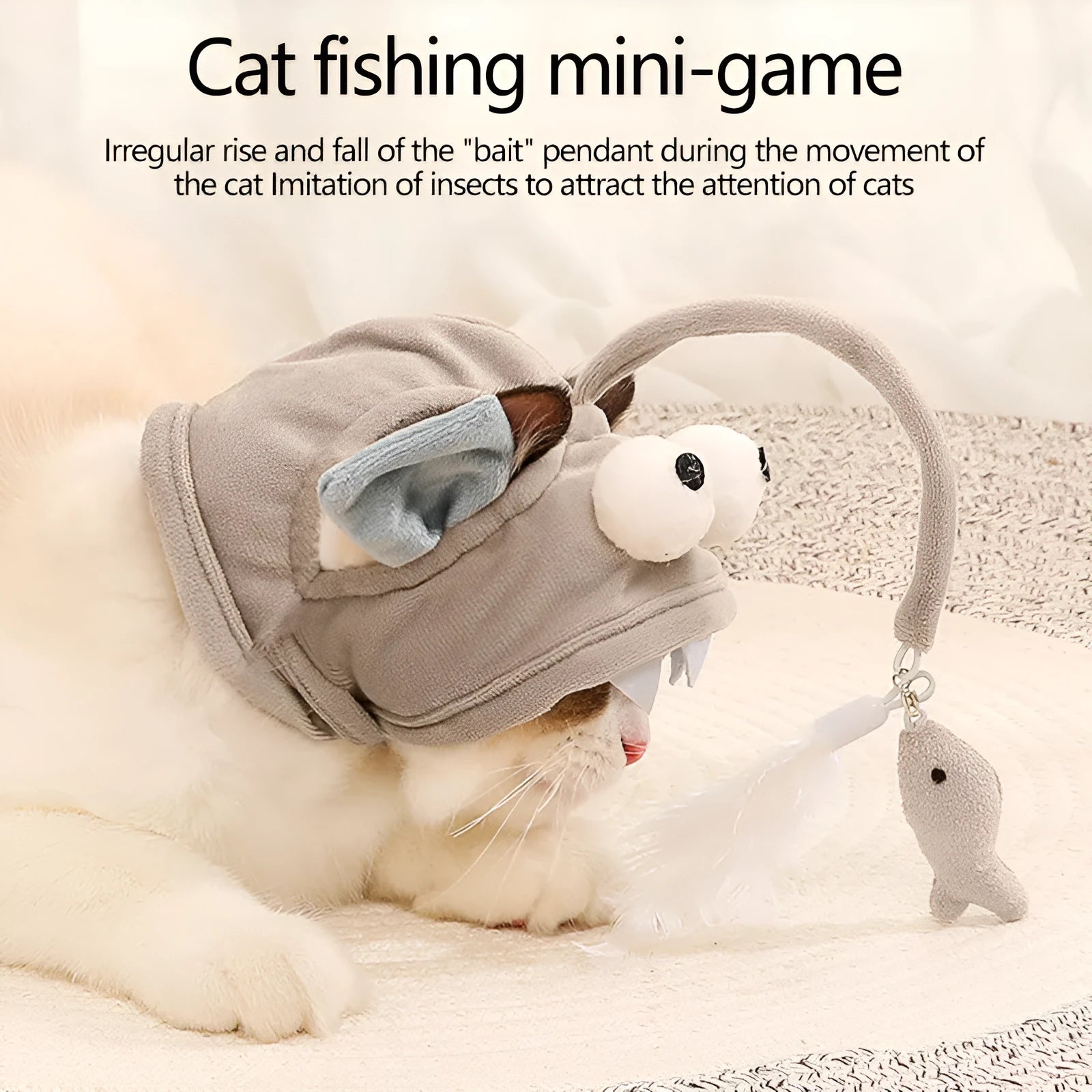 Grey dinosaur-themed head-mounted cat toy with feathers and big eye fish design on adjustable band