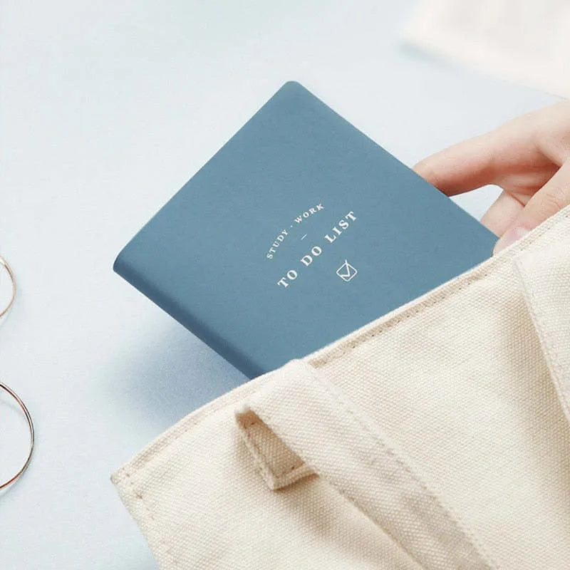 Simple style portable notebook with PU cover in blue, green, pink, or yellow, showing 96 inner pages.