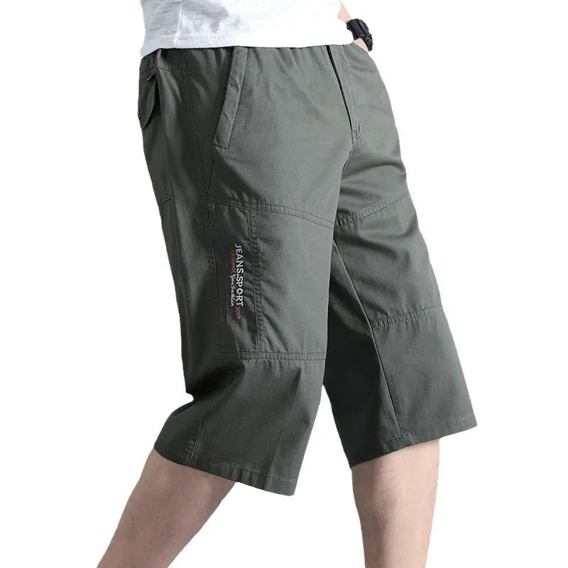 Men's cotton sports pants in loose fit straight-leg cropped design showing light grey colour option