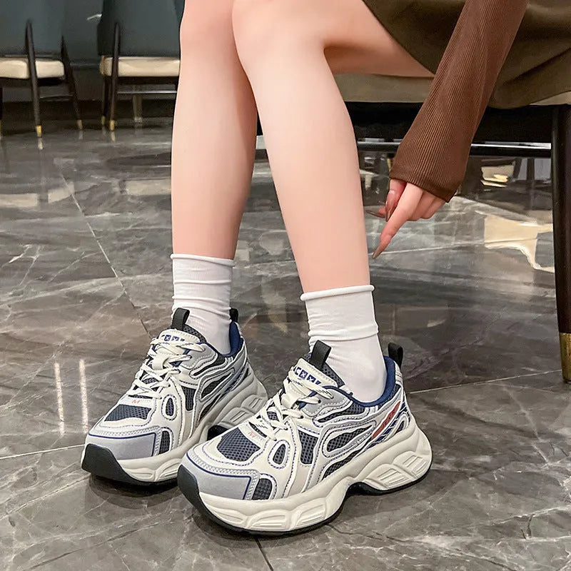 Women's casual breathable mesh board shoes in gray with thick rubber sole and front lace-up