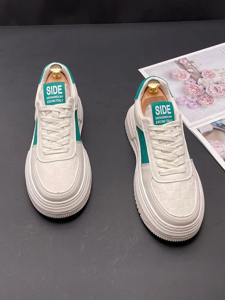 Unisex white, black, and green cloth sports casual shoes with rubber foam soles.